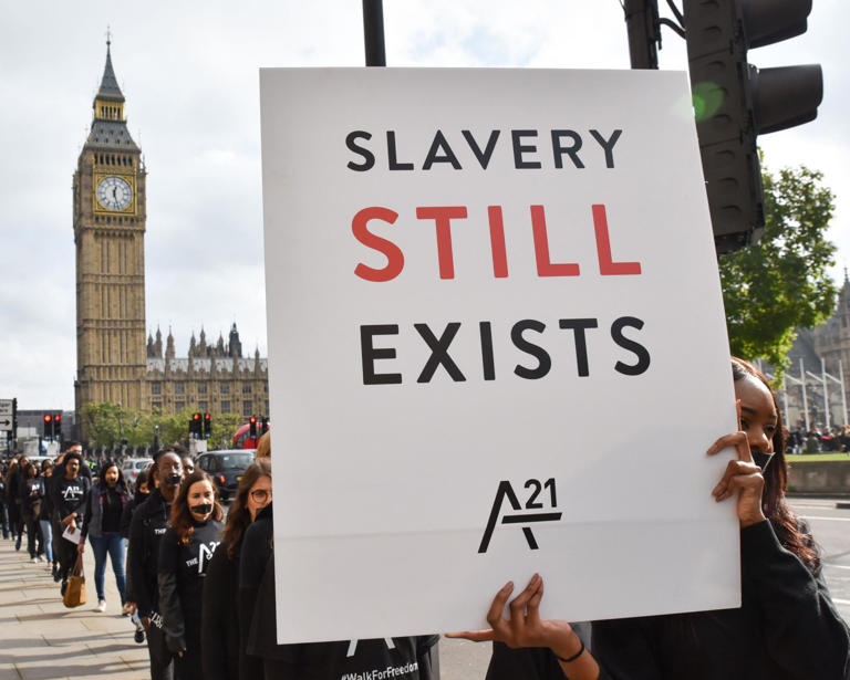 Protesters against human trafficking and modern slavery march in London. Photograph: Matthew Chattle/Rex/Shutterstock