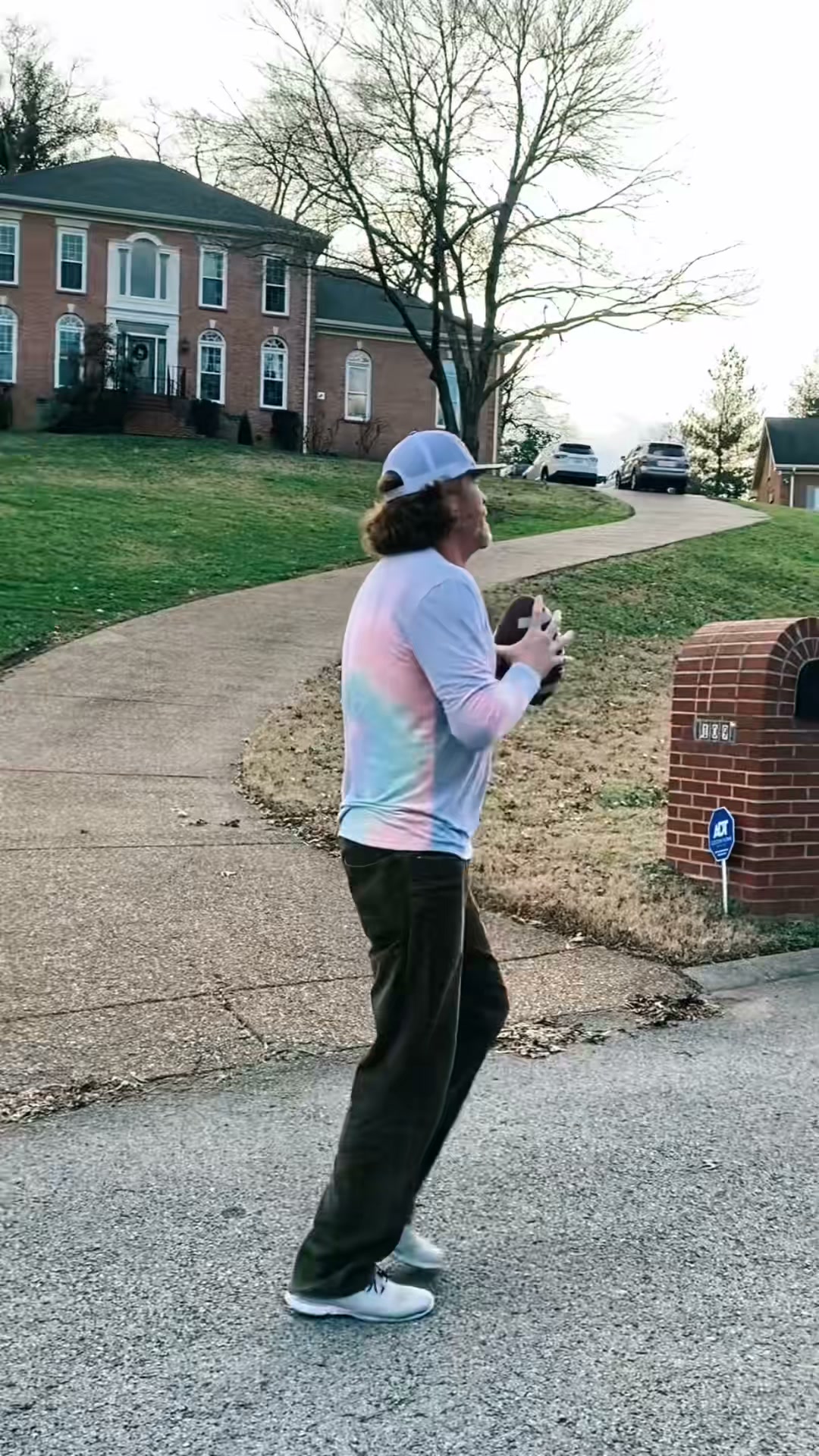 Throwing to the culdesac kids