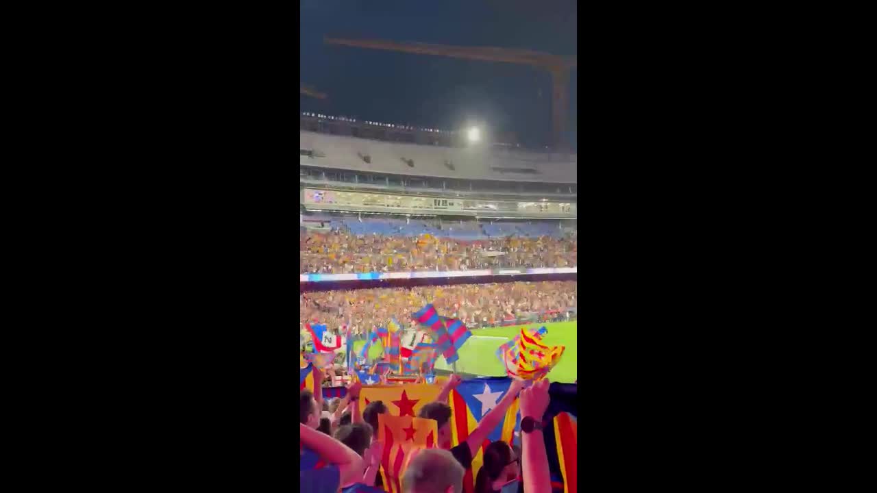 Barcelona fans wave Catalan flags at Camp Nou