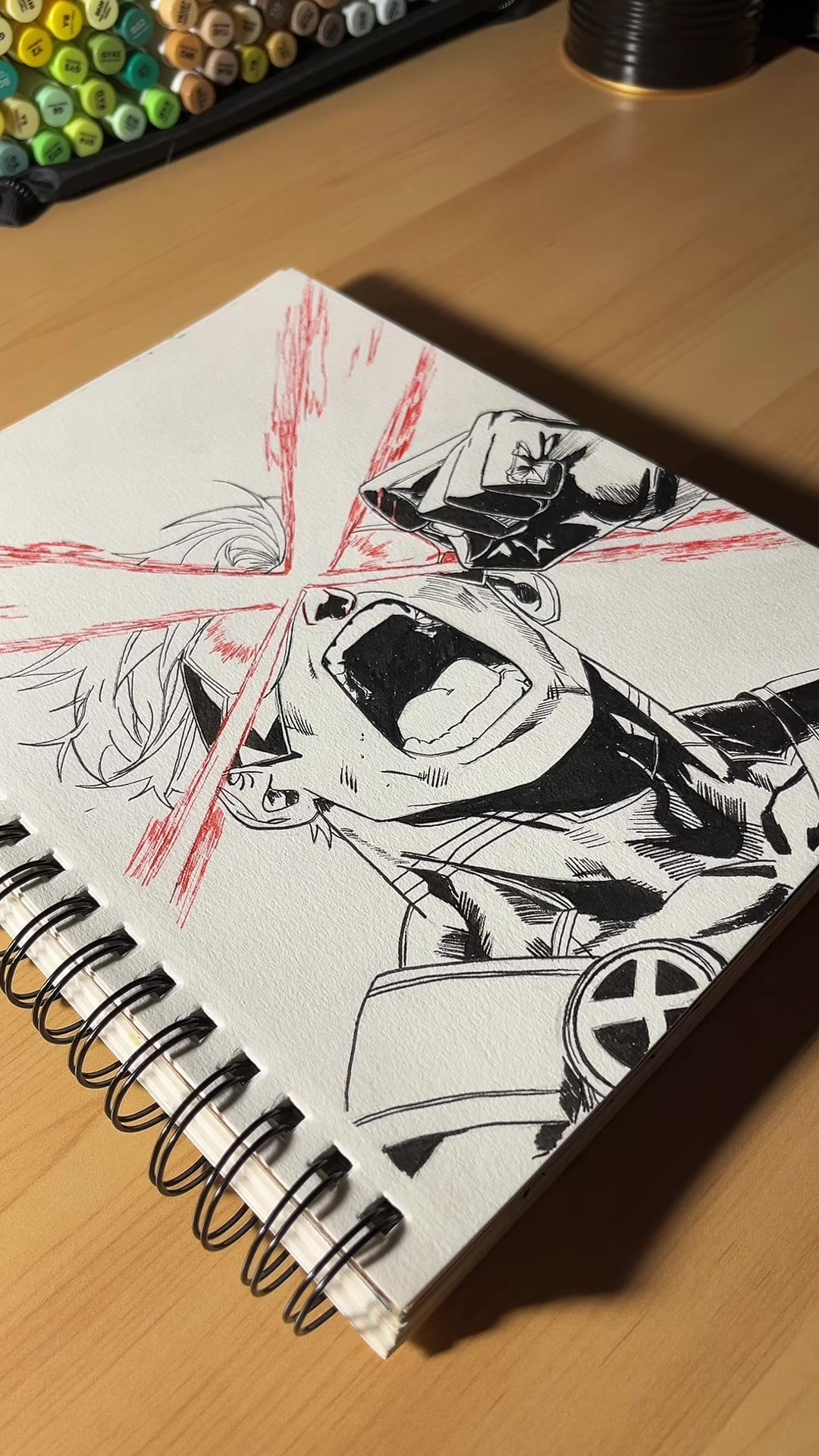 Creating Cyclops fan art through ink sketching