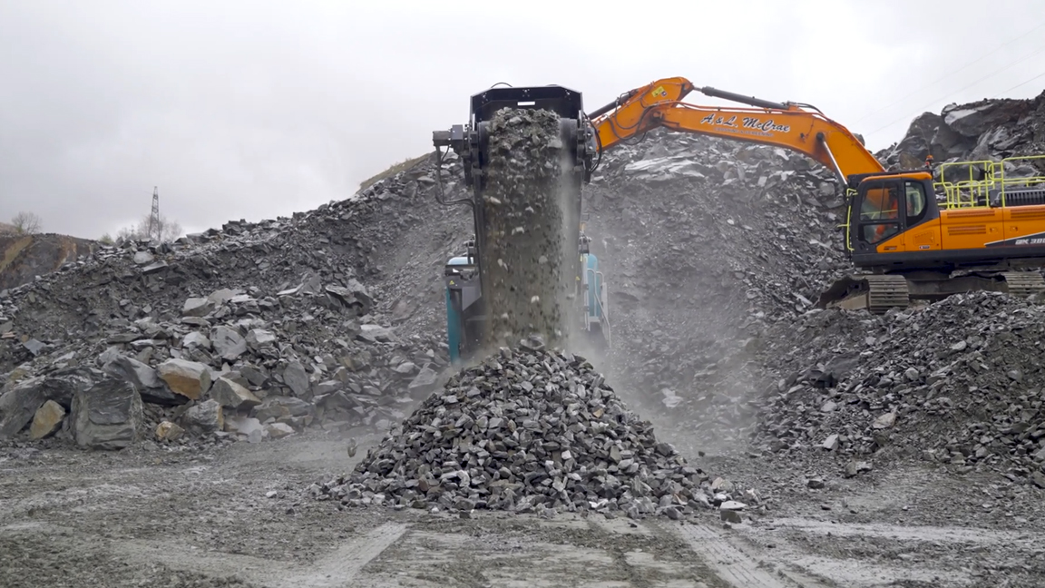 Massive rock crushing operation turns huge stones into aggregate