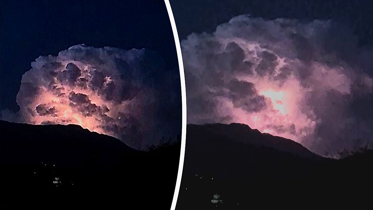 Lightning storm turns clouds pink and purple over Italian village