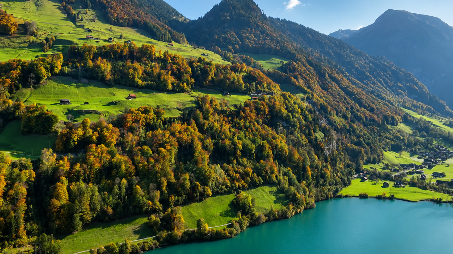 Small farms cover these steep mountain slopes