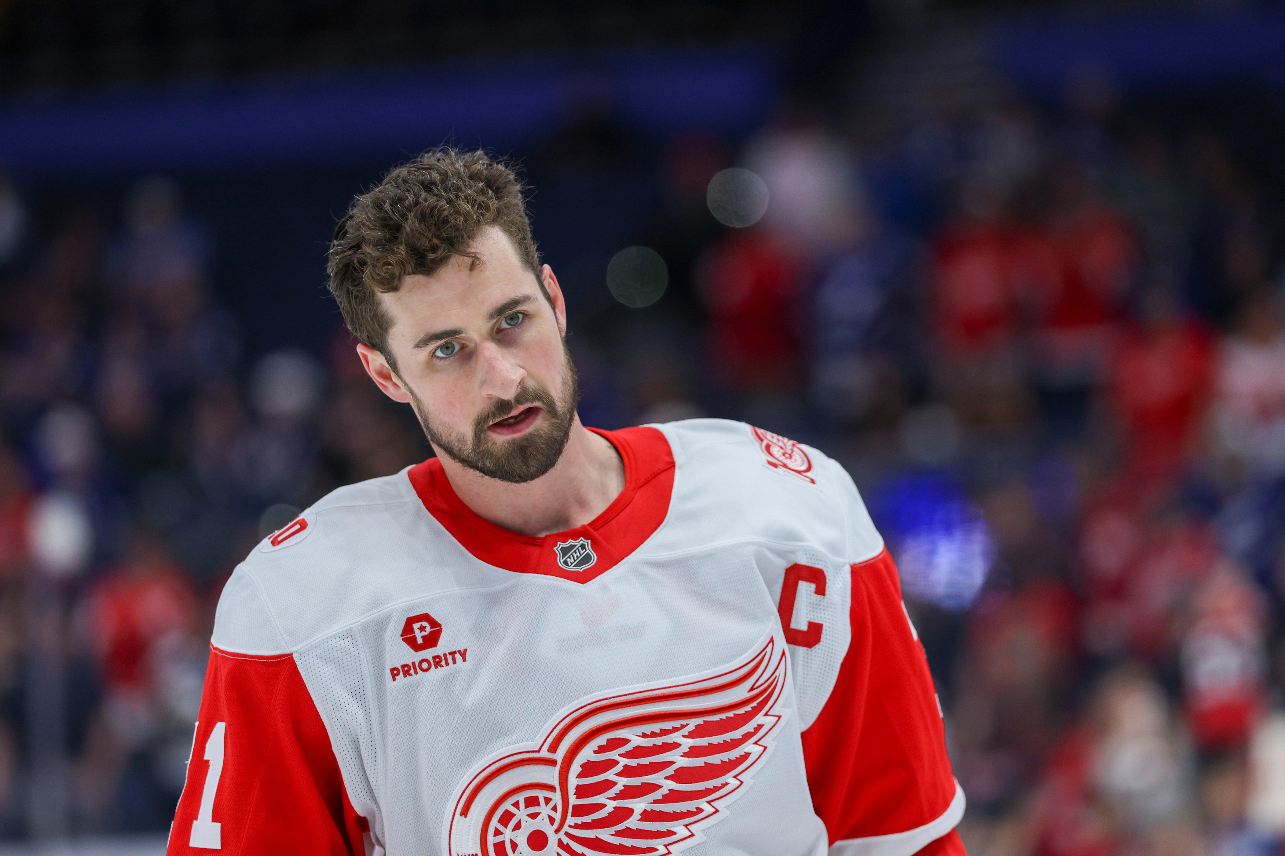 Red Wings' Dylan Larkin to report to training camp but not as captain