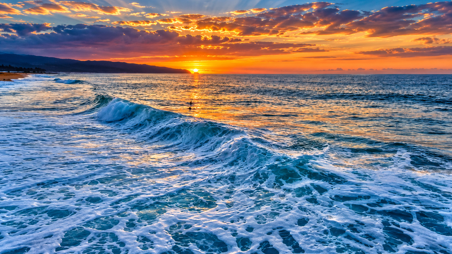 Polihale State Park beneath a colorful Hawaiian sunset