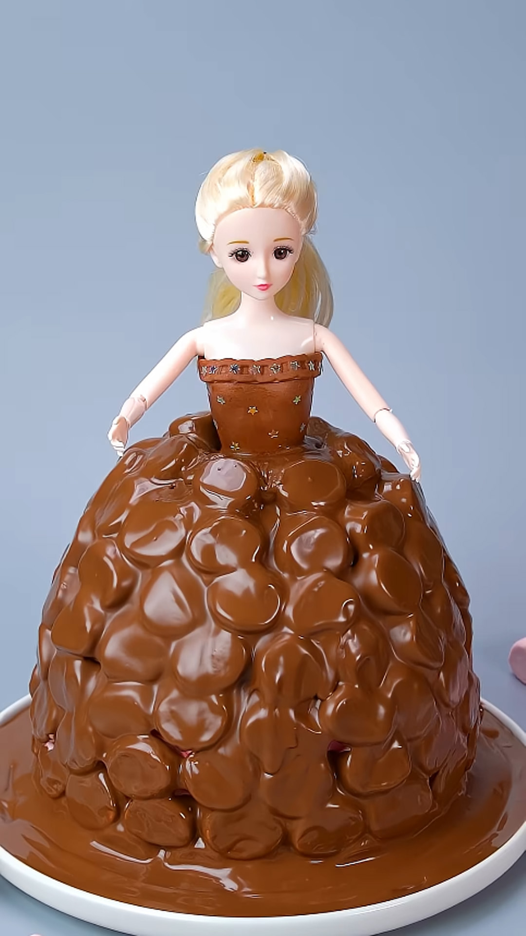 Decorating a beautiful princess cake with marshmallows