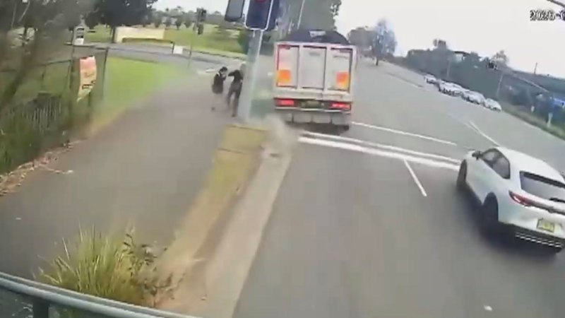 Heart-stopping moment truckie ‘almost hit two school girls'