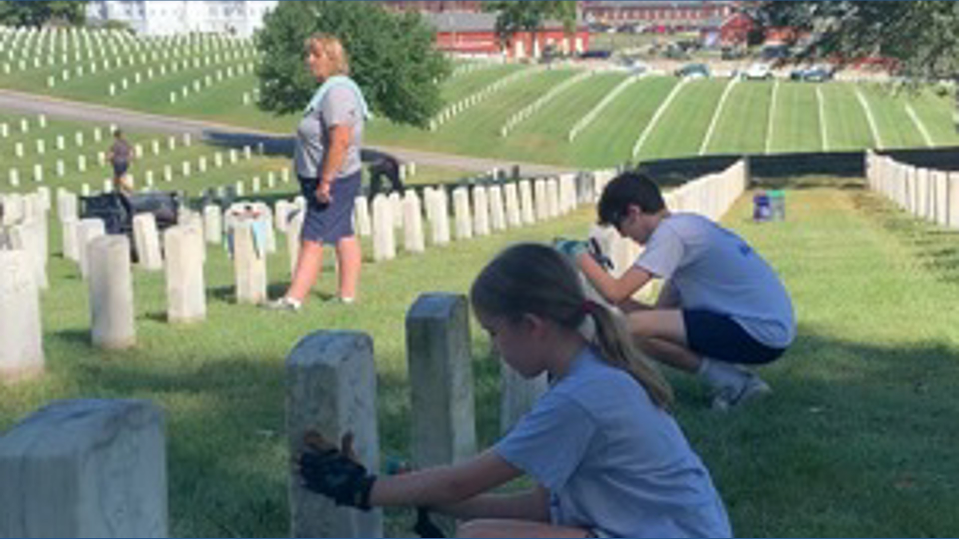 Volunteers clean headstones at Jefferson Barracks on 9/11 National Day ...