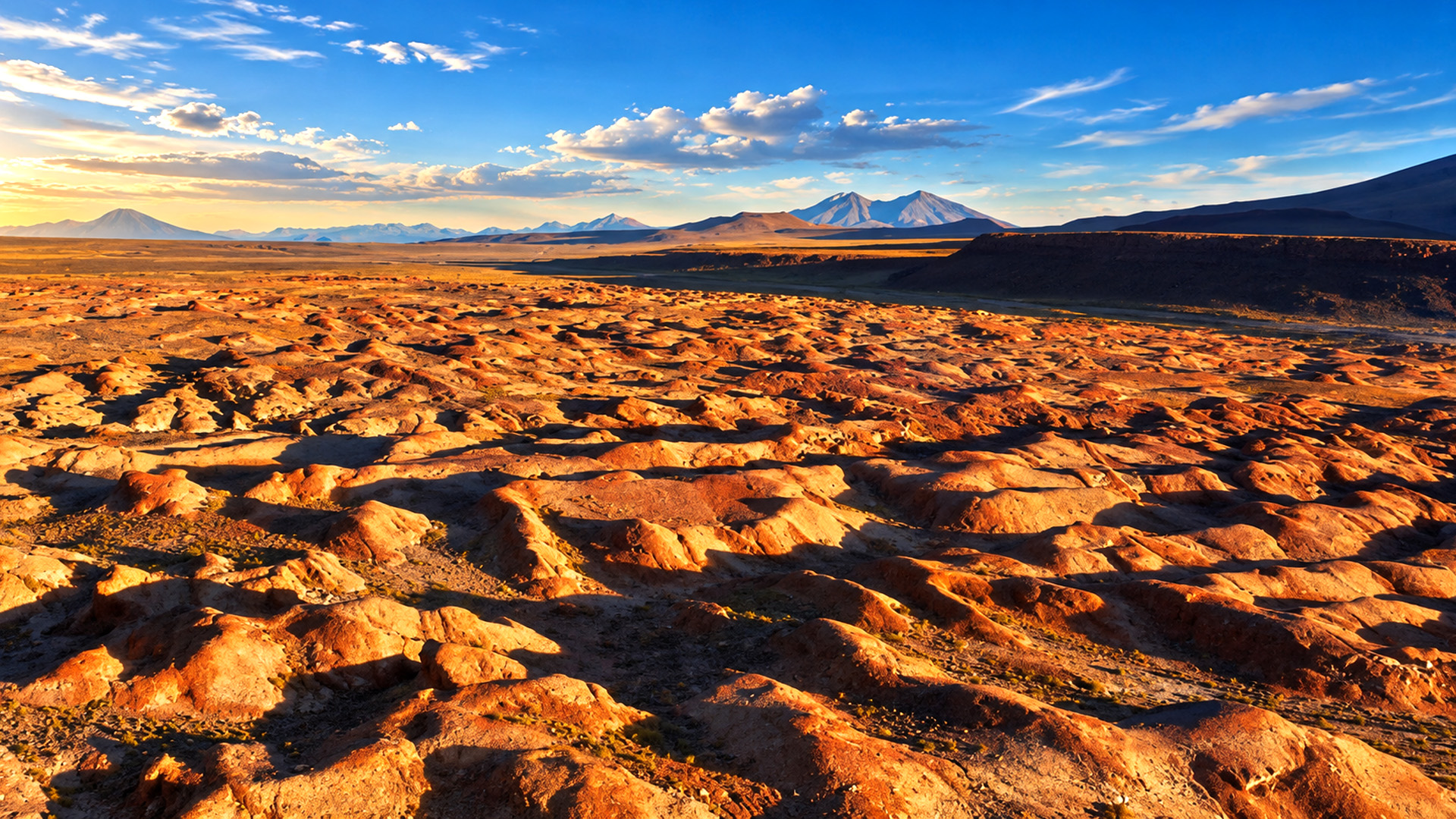 Vast Uyuni salt flats beneath the Andean mountains
