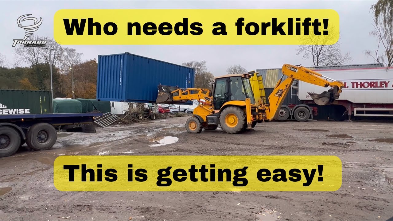 Unloading a 20ft shipping container with a JCB 3CX