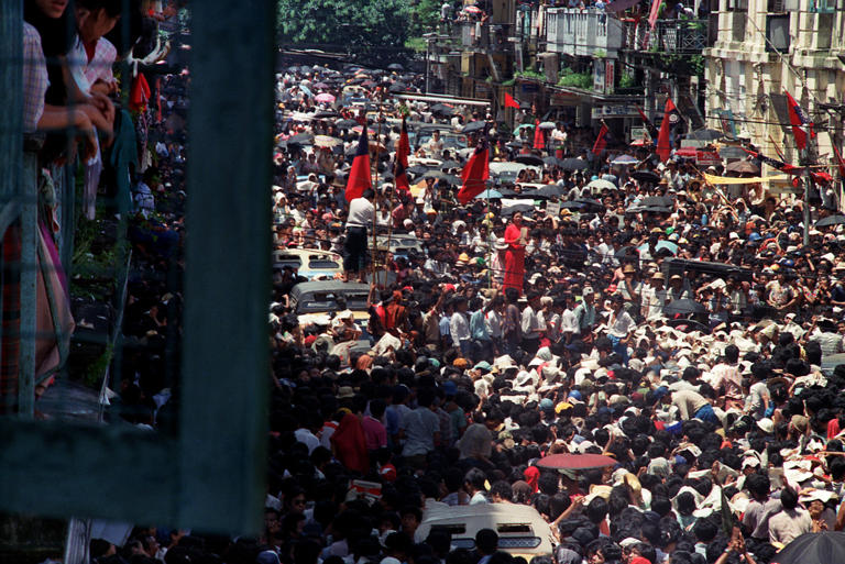 Antigovernment demonstrators filled the streets of Yangon, Myanmar, during a 1988 wave of protests in which Min Zin took part.