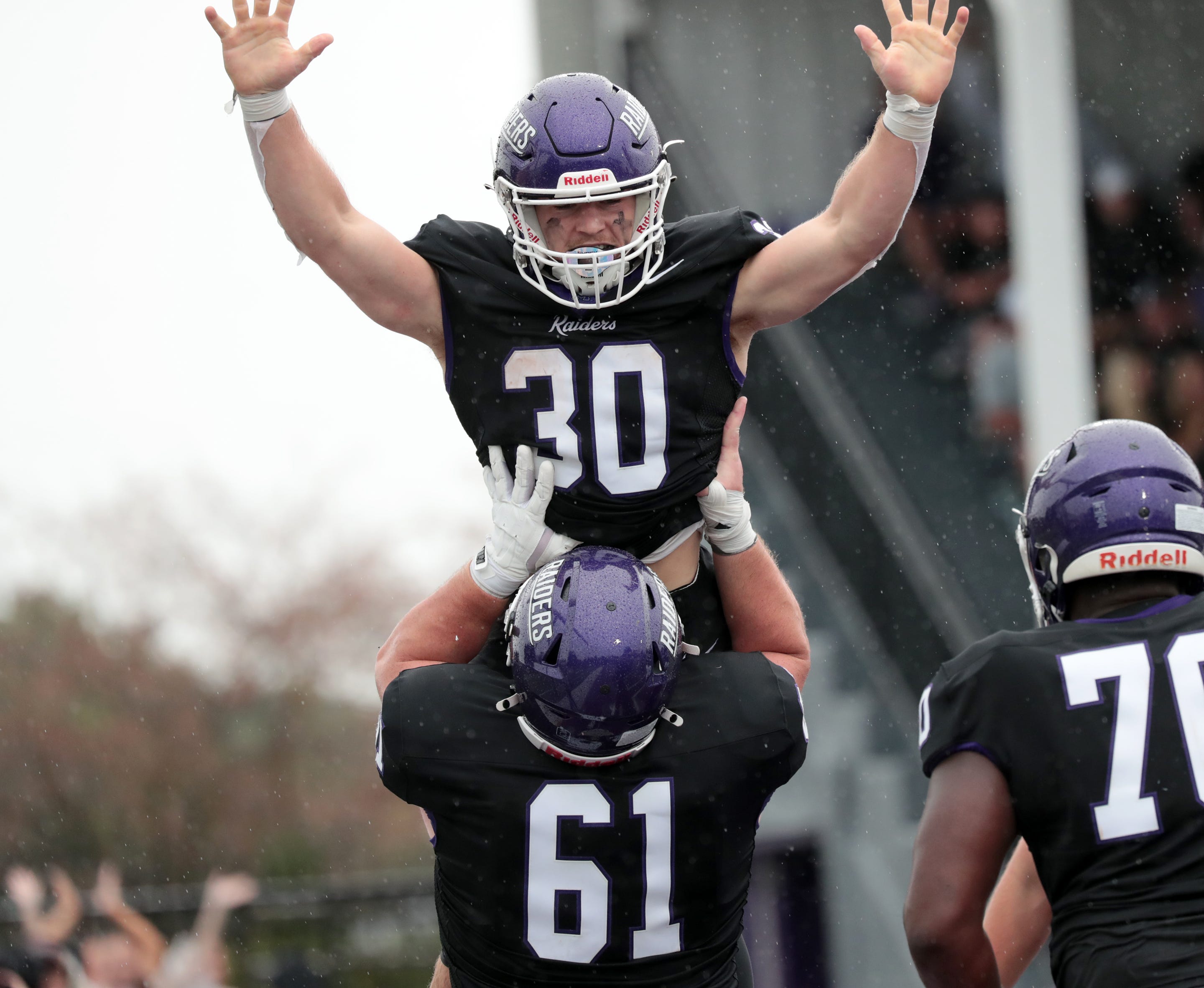 Mount Union football score. Record-setting day for Purple Raiders in rout