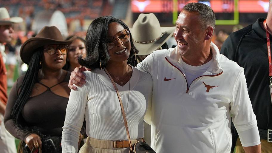 Texas HC Steve Sarkisian's wife Loreal shows off killer boots for Buckeyes game