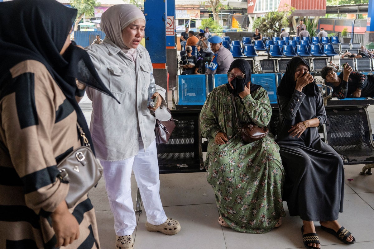 Six dead and 130 missing after Indonesia ferry overturns in rough seas