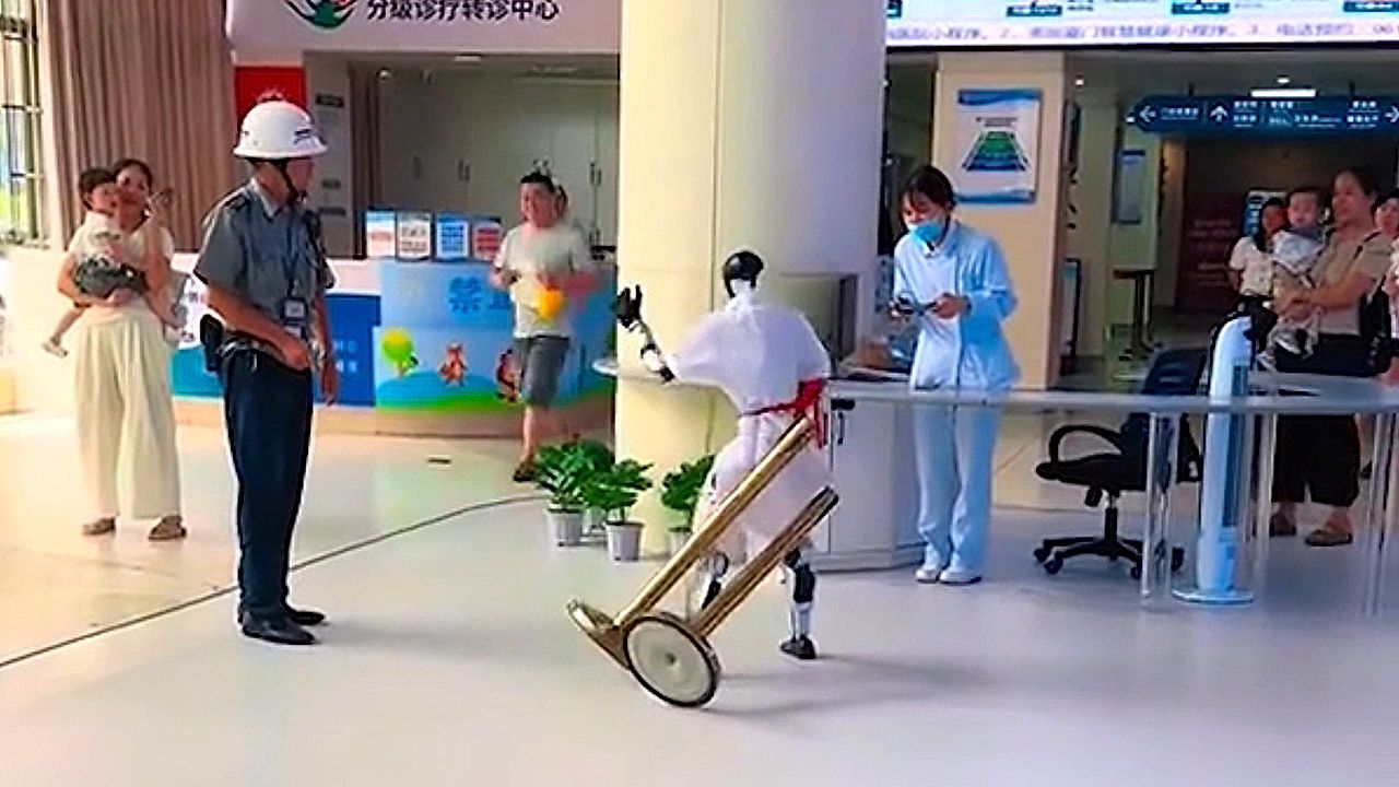 Humanoid robot nurse gets tangled in hospital queue barrier