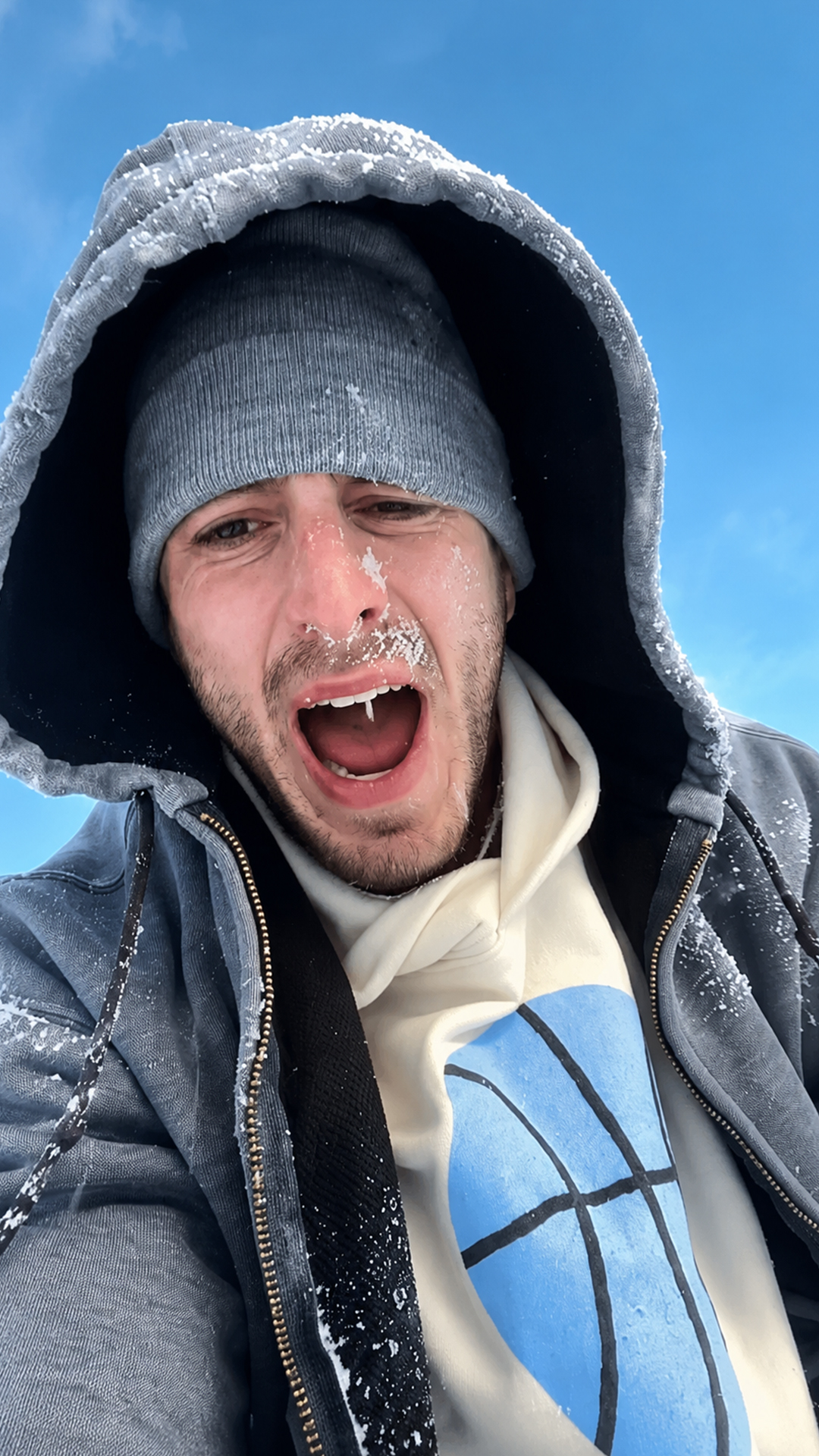 Winter ice patch catches a walking pedestrian completely off guard