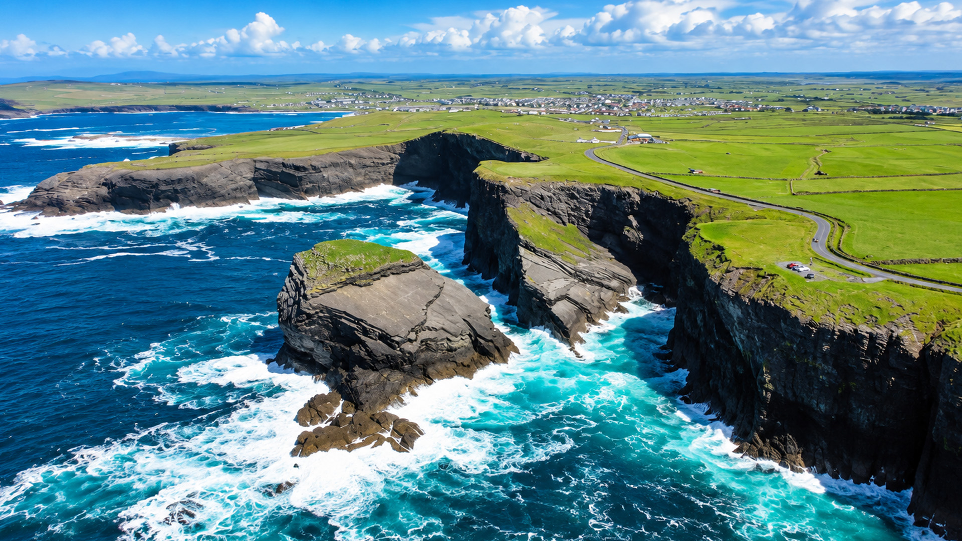 A coastal road runs beside steep Atlantic cliffs