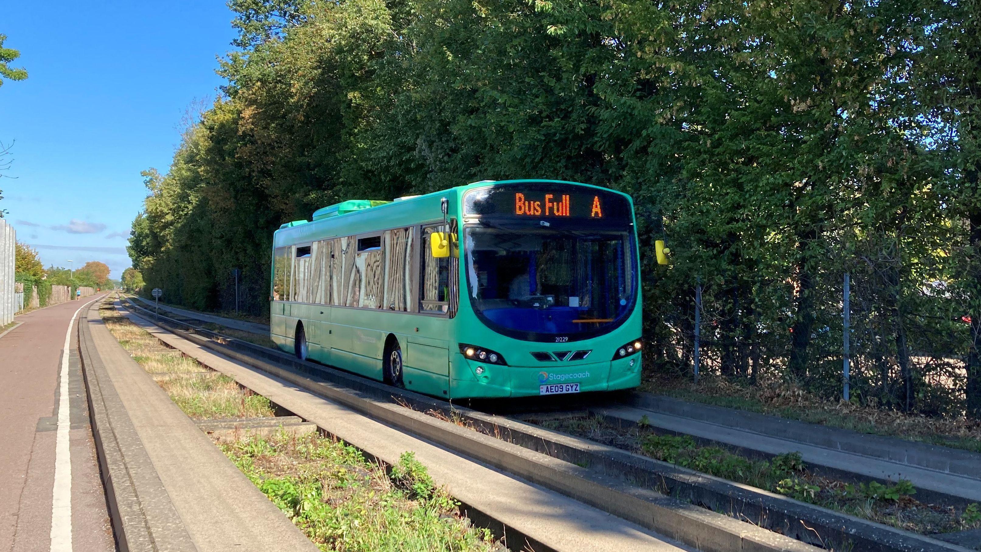 What is a busway and why is one being built through greenbelt?