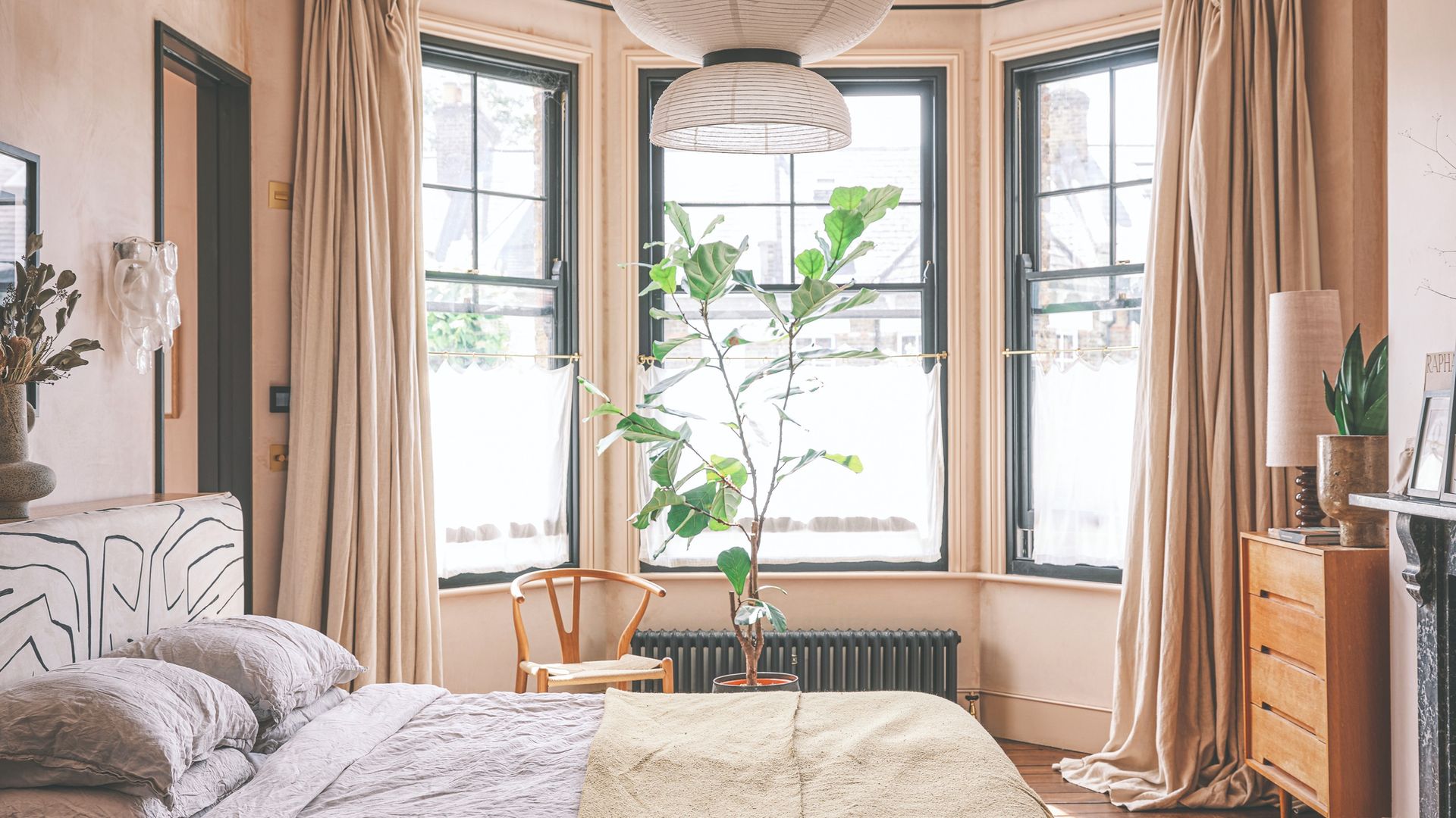 'Curtain-stacking' is the simple trick experts recommend for making a ...