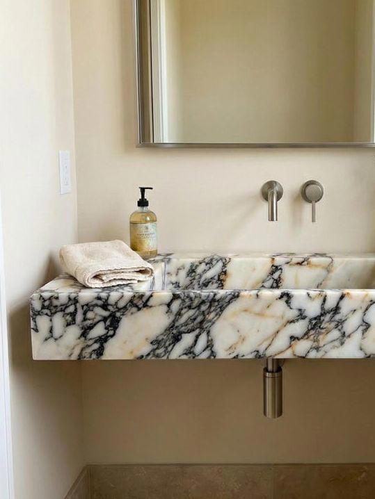 Designing a tiny bathroom? This is where I'd spend my design budget for ...