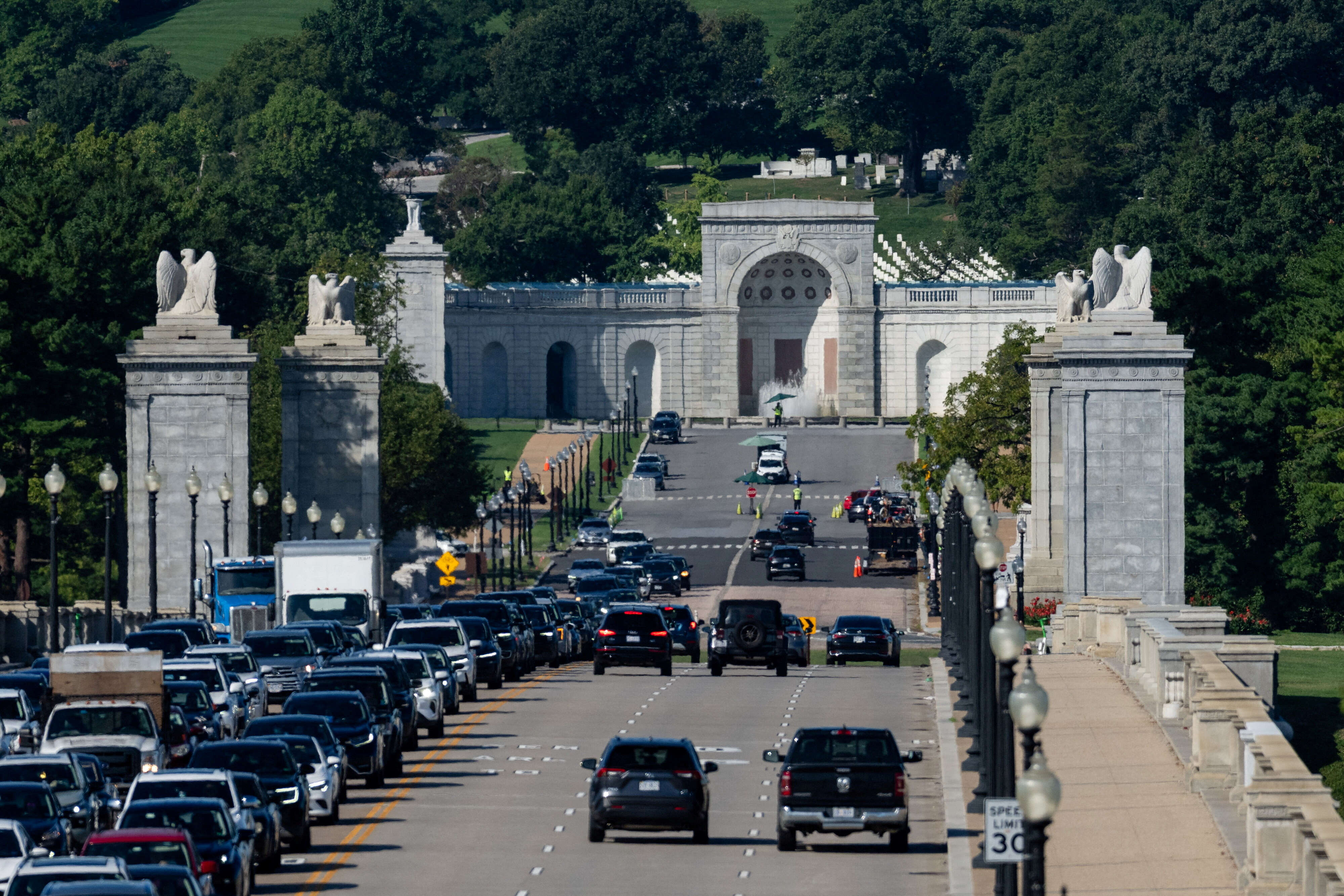 Trump says his planned arch would become 'military complex' able to ...