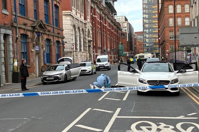 Two arrested as counter-terrorism police swoop in Manchester city centre