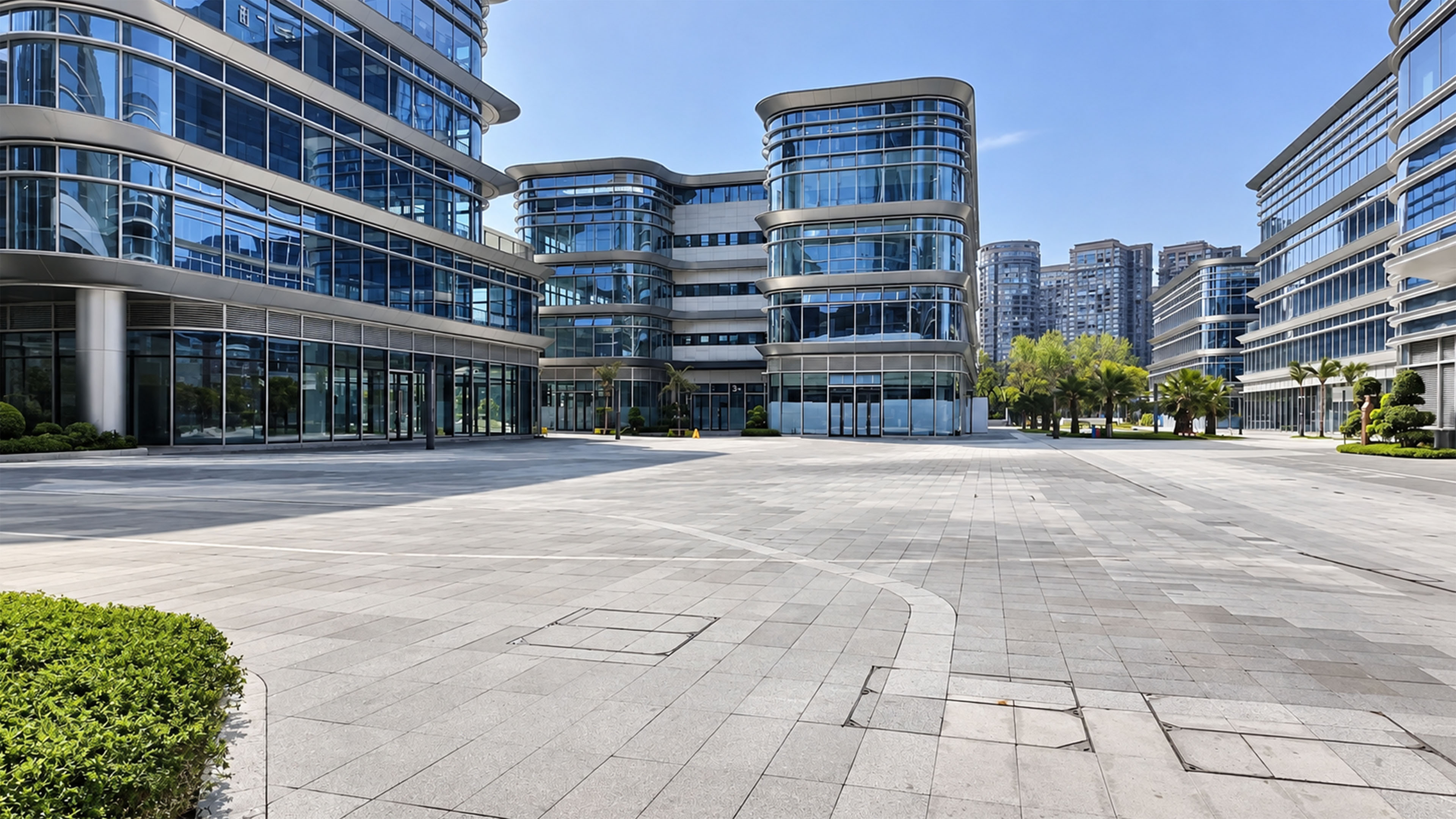 China builds futuristic glass blocks around a silent plaza