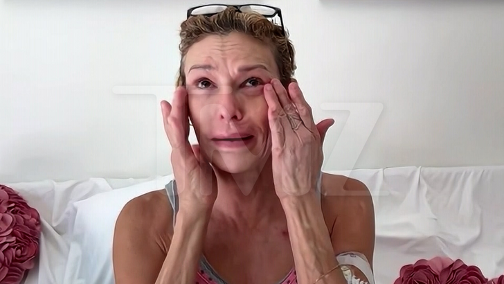 Brandi Glanville undergoing surgery to remove facial gunk and organisms