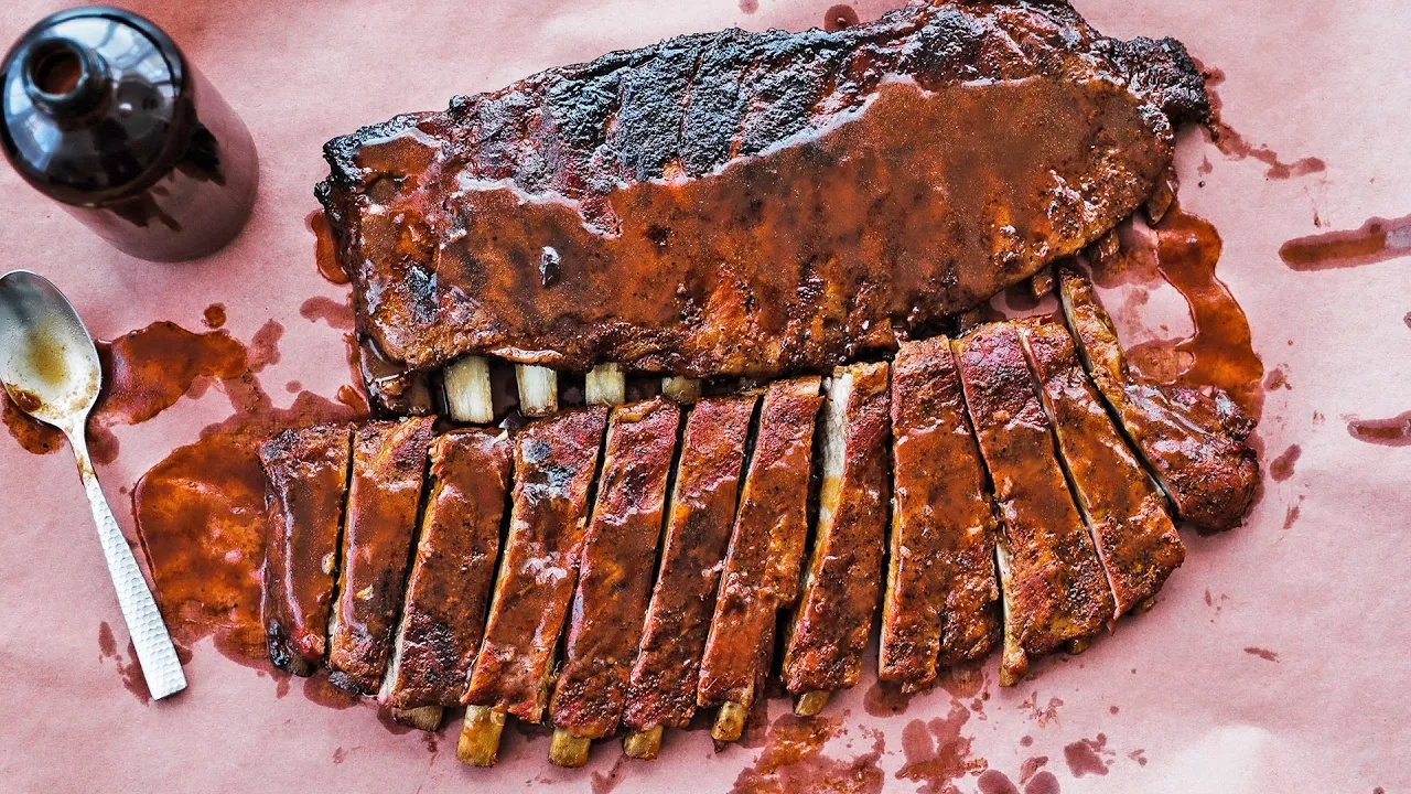 The ribs spend hours in the smoker... then this BBQ sauce changes ...
