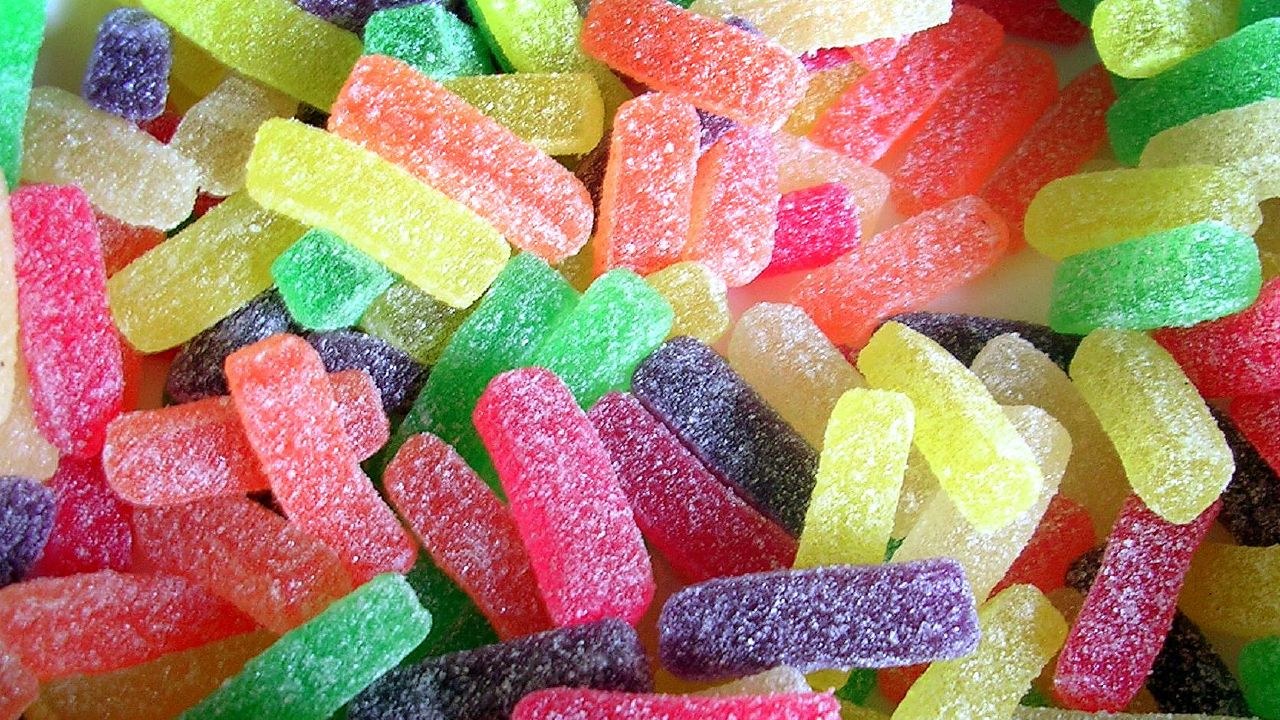 A rolling ball on 2.3 million candy bottles can come off and choke a child