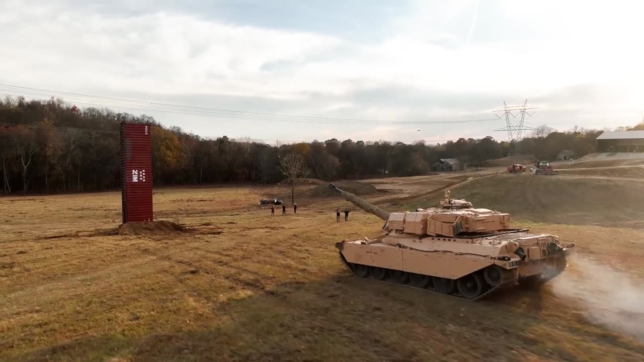 Watch what happens when a tank hits a 40-foot shipping container