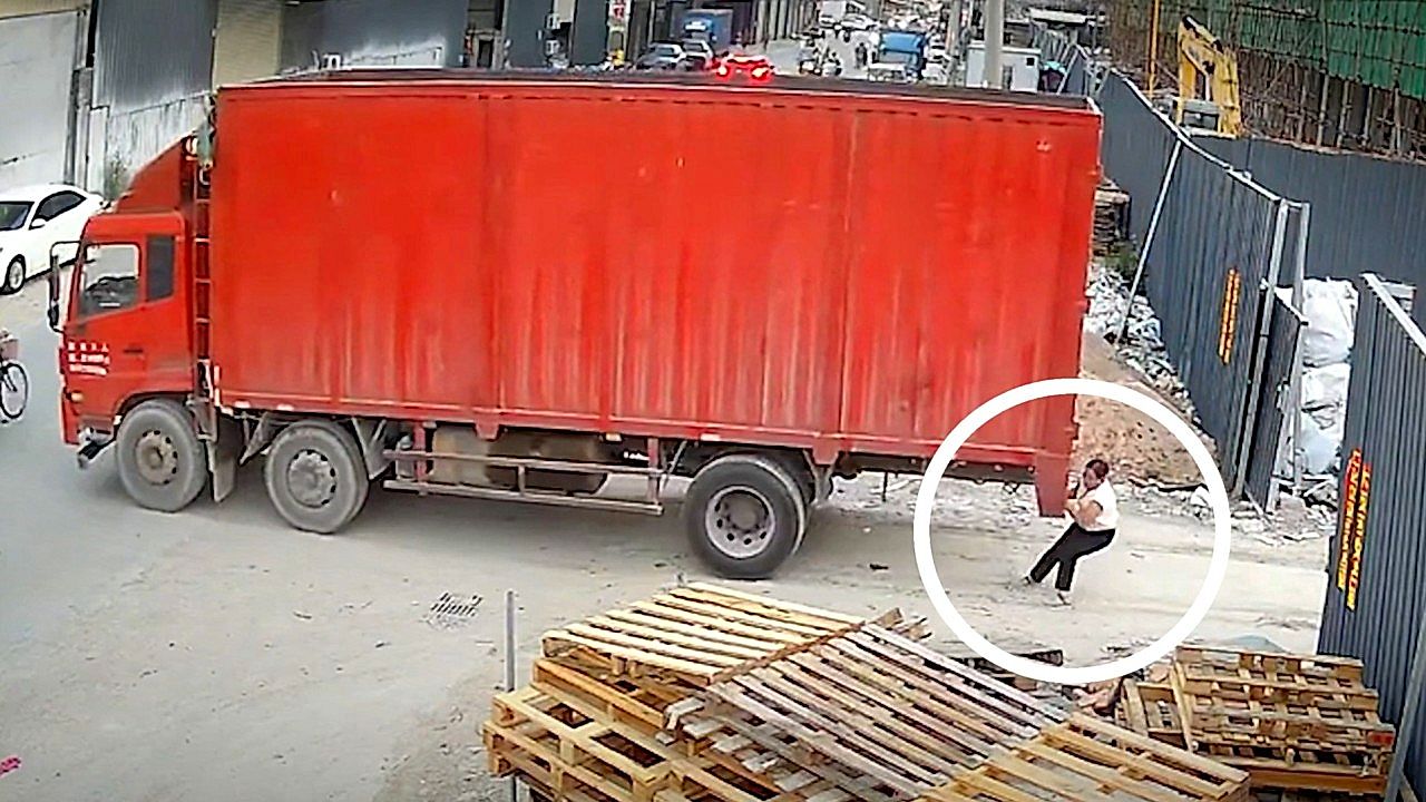 Woman clings to runaway 20-tonne lorry mid-chase — and somehow stops it