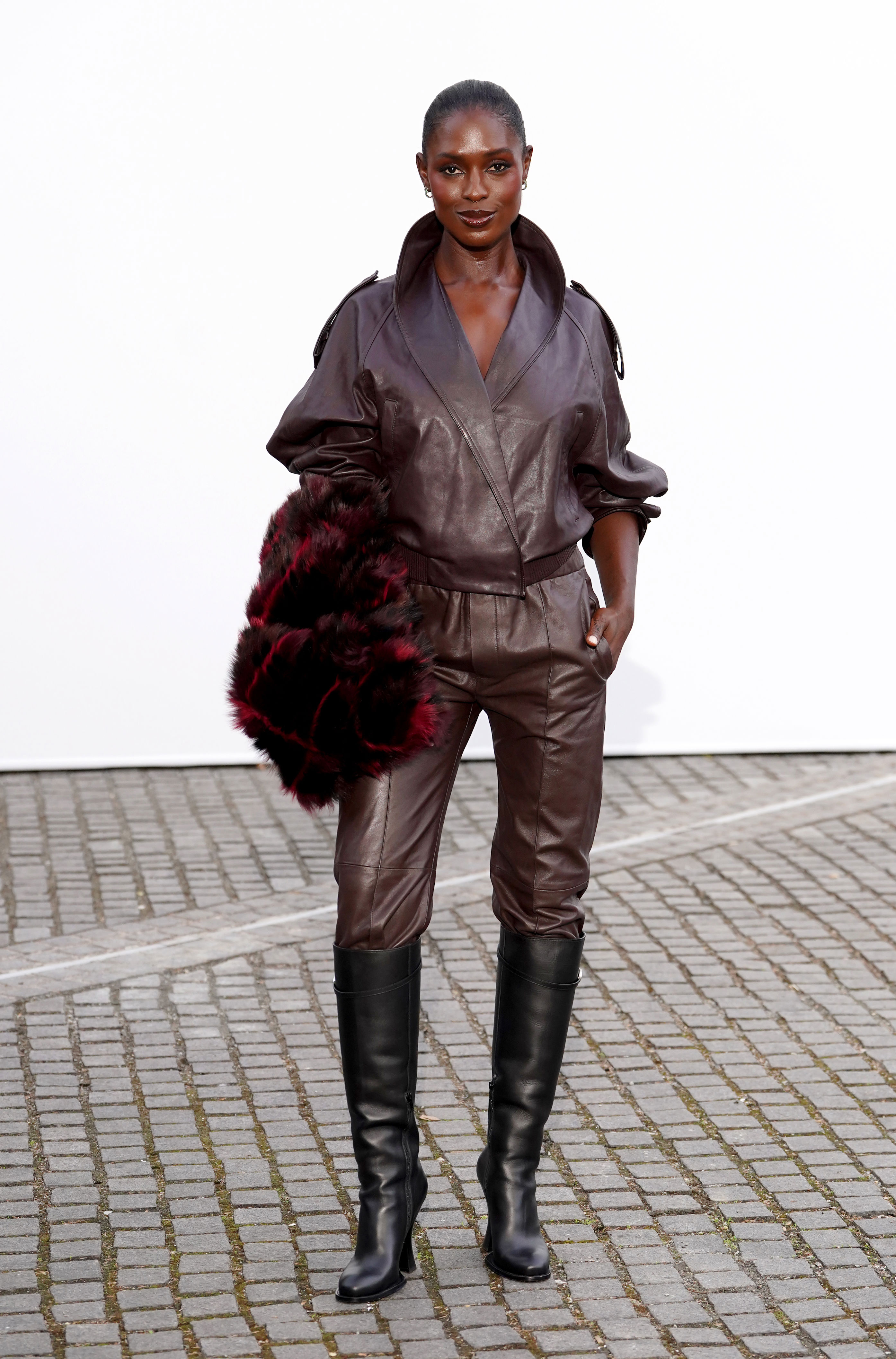 Romeo Beckham leads celebrities at Burberry's London Fashion Week show