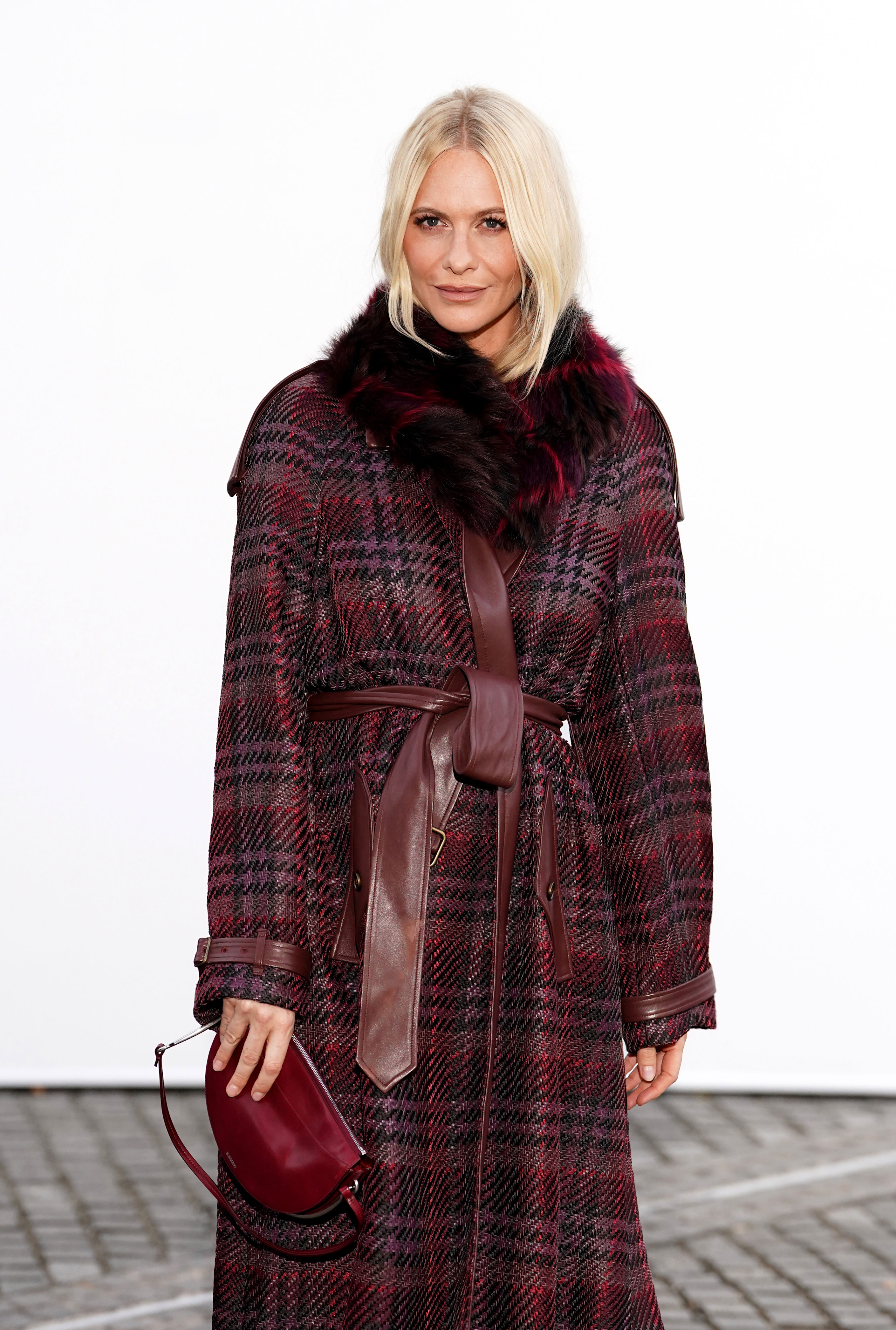 Romeo Beckham leads celebrities at Burberry's London Fashion Week show