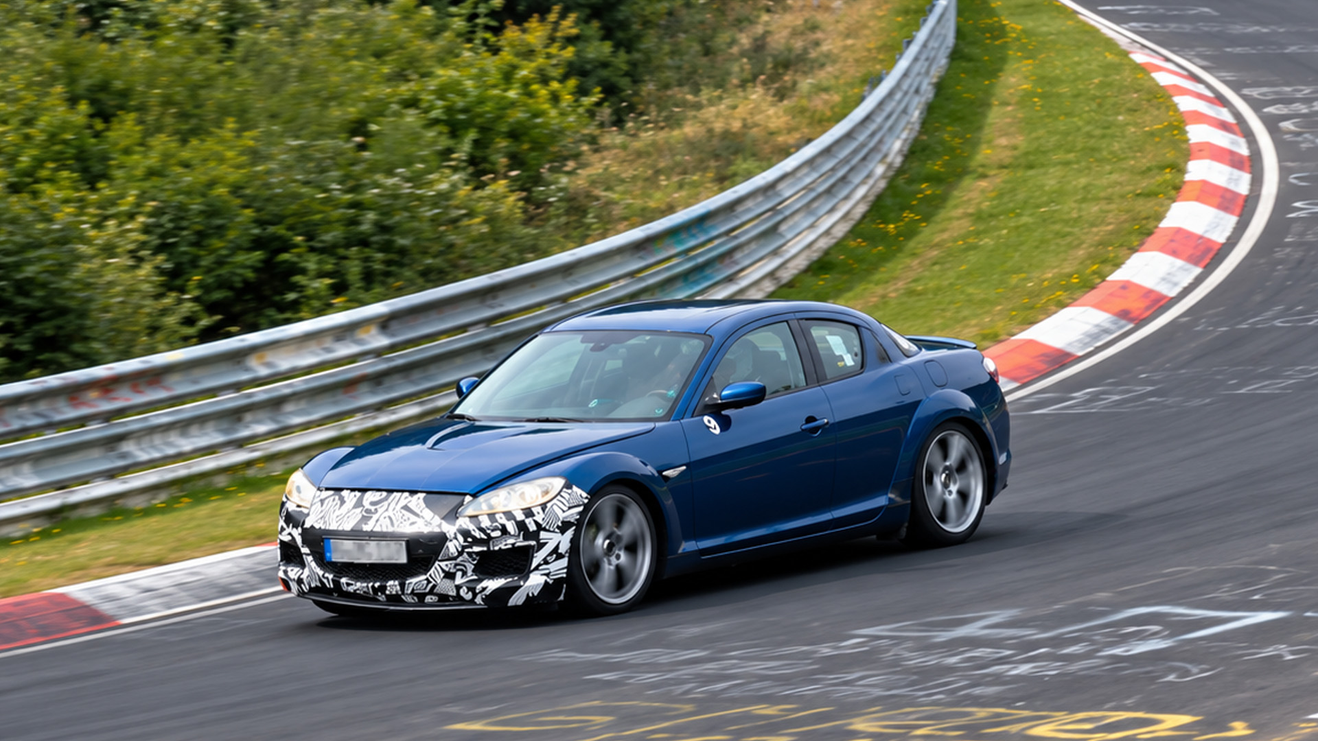 Mazda RX-8 prototype takes on high-speed corners