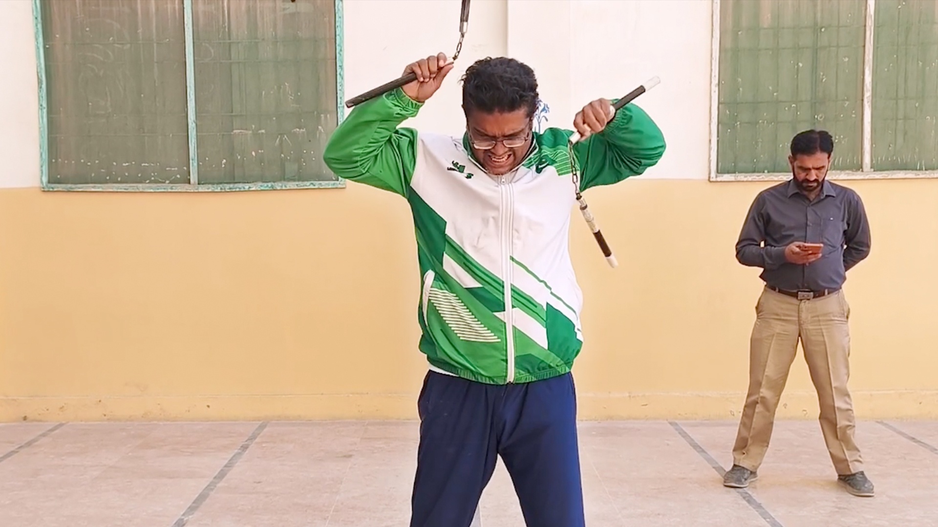 Most double nunchaku triangle strikes in one minute - 162 by Muhammad ...