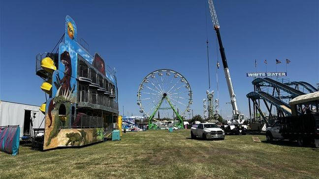 Kern County Fair countdown begins as crews set up rides, midway and ...