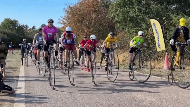 Cyclists compete in annual British penny farthing race in London