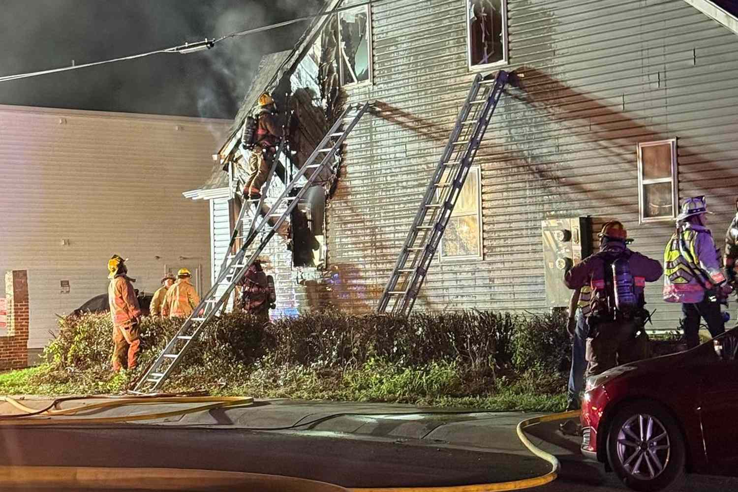 Teacher runs into burning home barefoot to save neighbor: 'Bona fide hero'