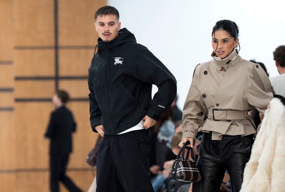Romeo Beckham leads celebrities at Burberry's London Fashion Week show