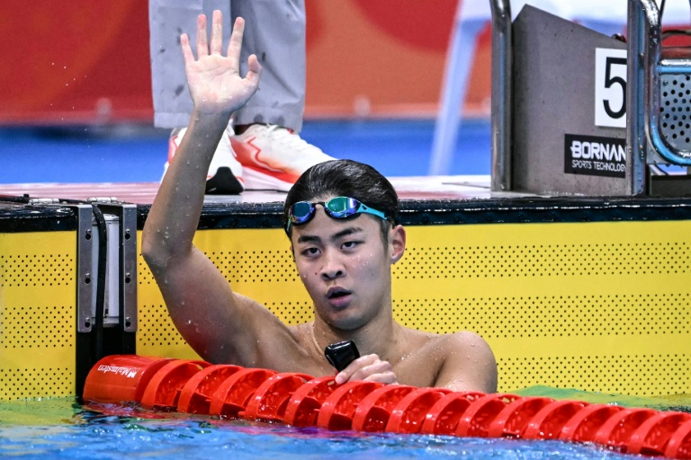 Japan's Kojima sounds Marchand warning with Asian Games gold