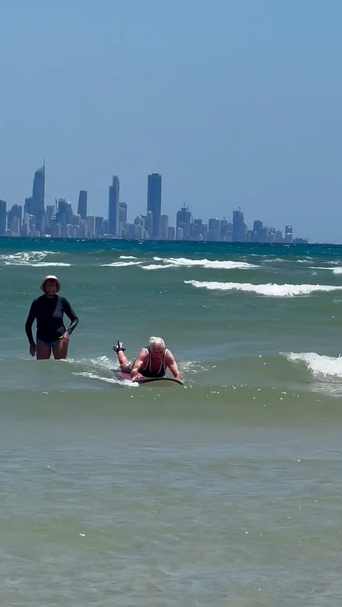 95-year-old surfer with visual impairment continues riding waves