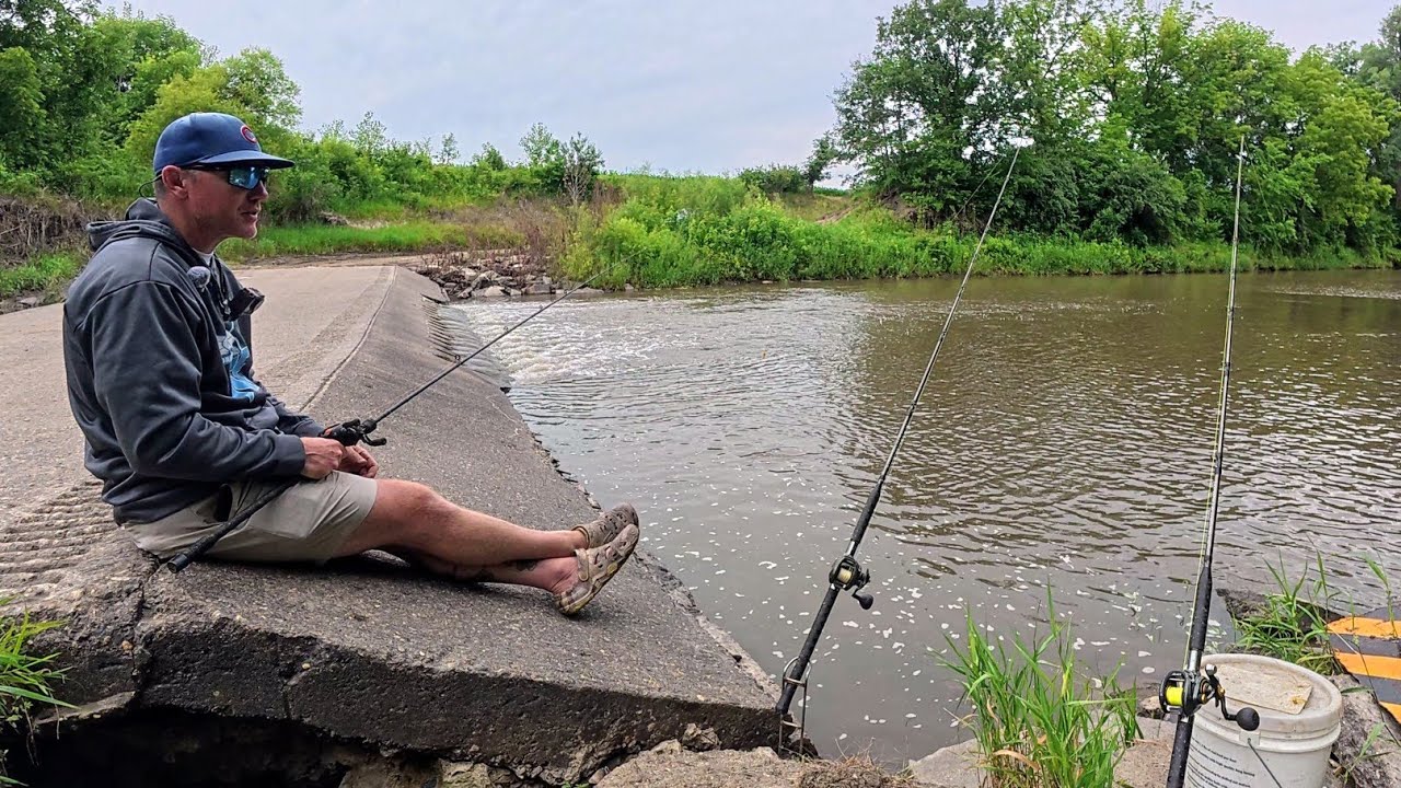 Bait fishing a small river spillway