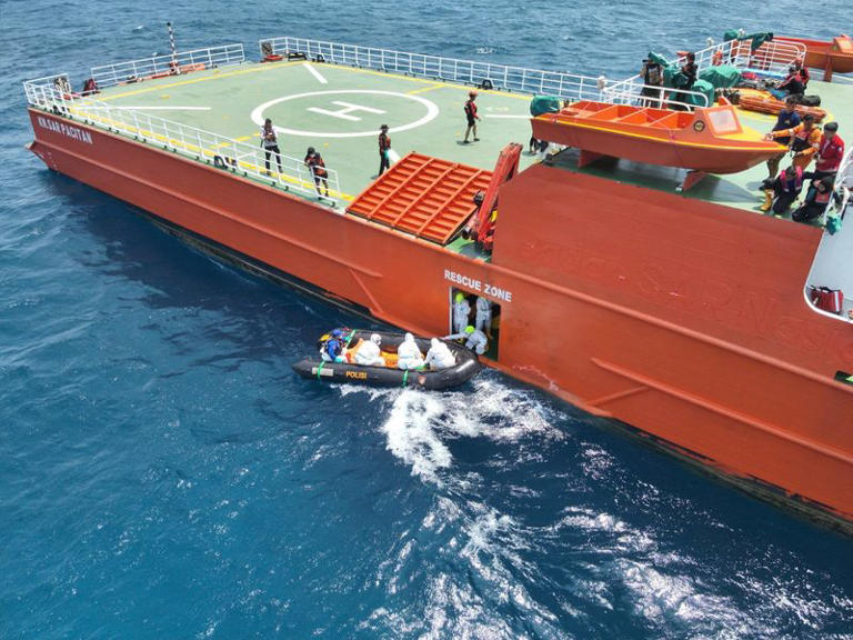 Death toll from capsized ship in Indonesia rises to 26 as search ...