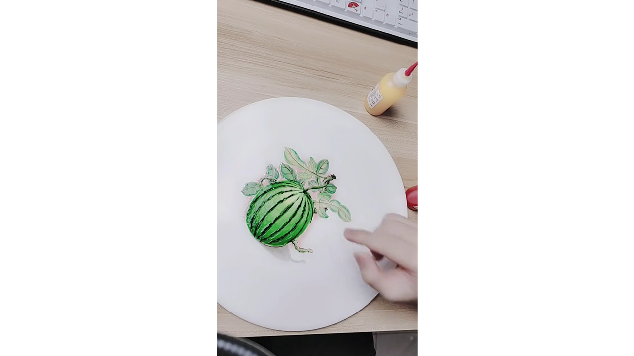 Drawing realistic watermelon with colored ink creating fresh fruit ...