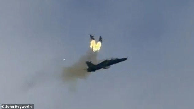Moment two RAF pilots eject from Hawk jet caught in spectacular video ...