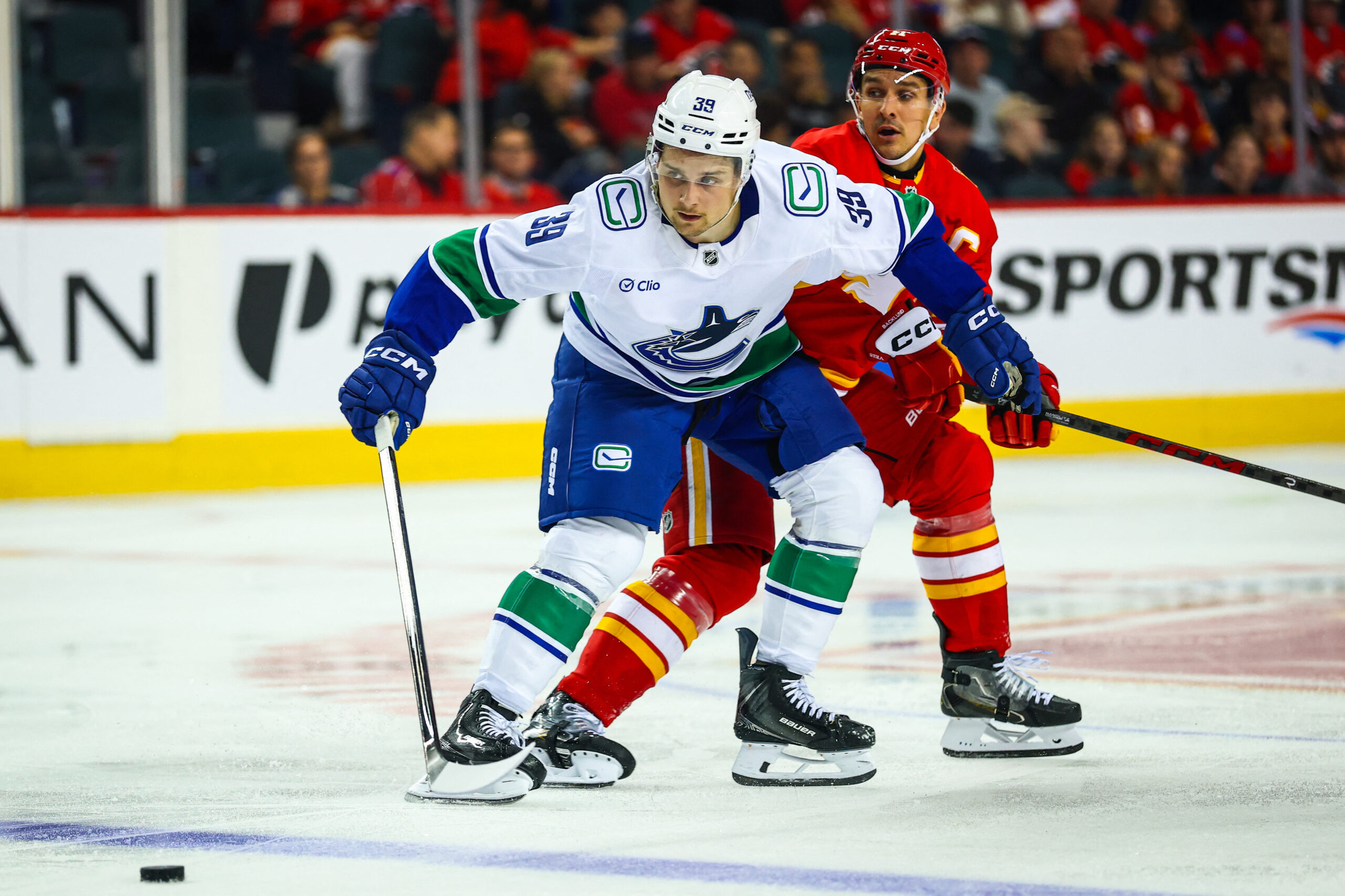Canucks place 3 players on NHL waivers, make 15 more roster cuts