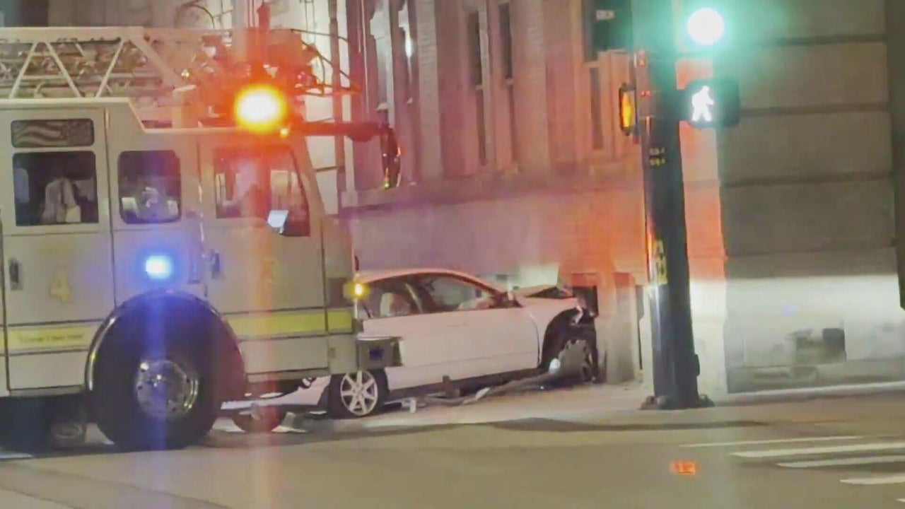 Car crashes into building in downtown Denver