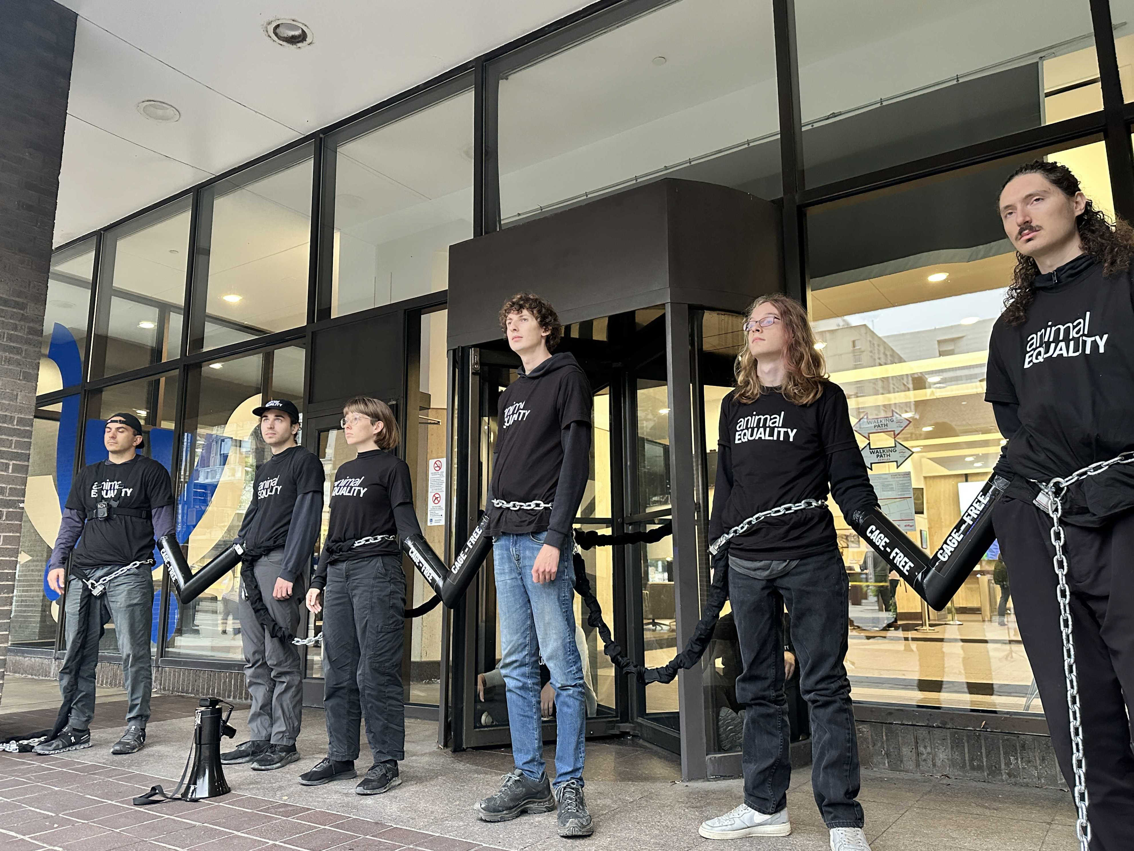 Police: 9 arrested after protesters chain themselves to Kroger headquarters