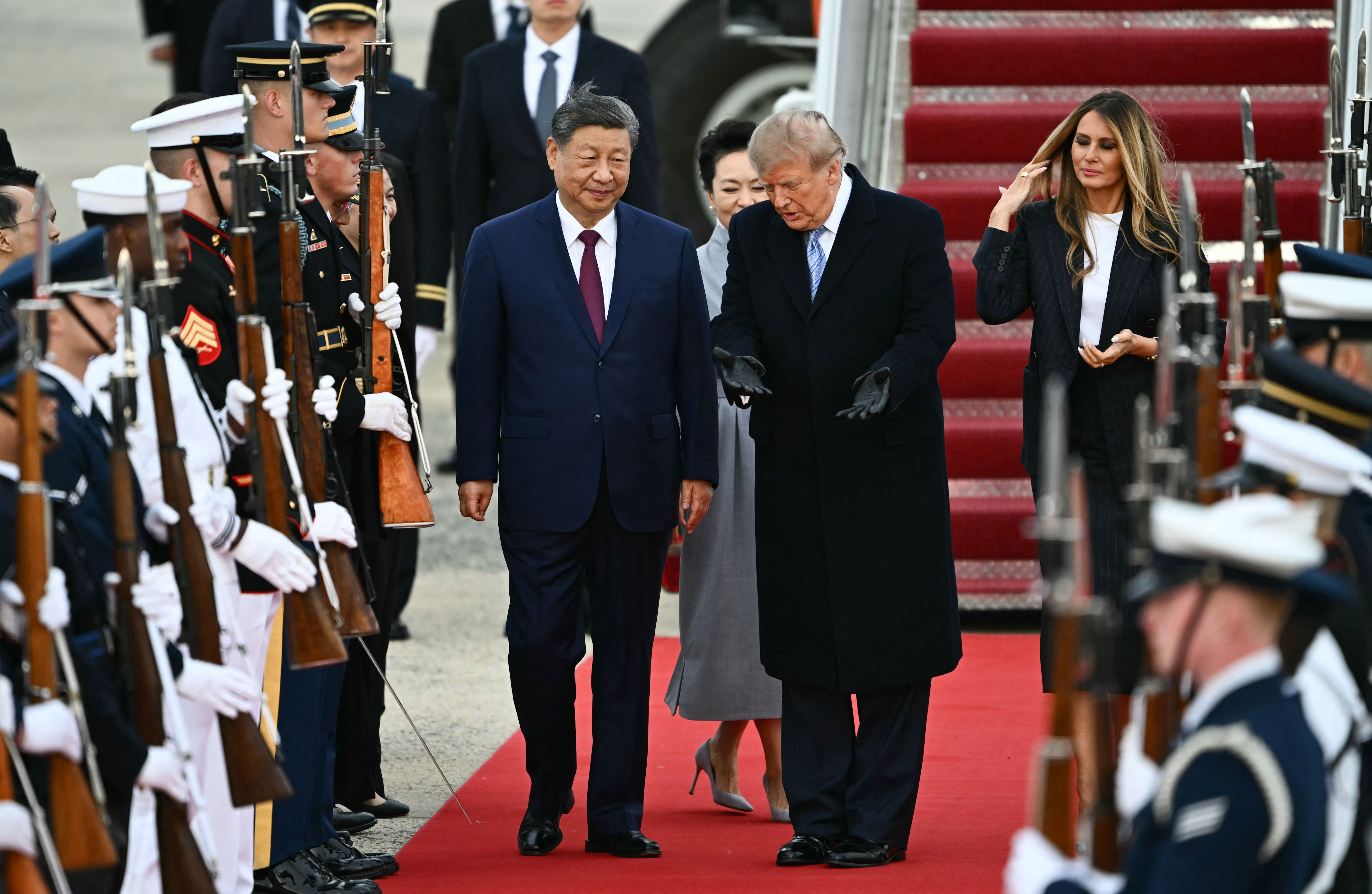Trump mocked as he welcomes Xi in winter gear during airport greeting